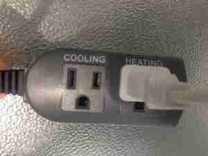 INKBIRD plug-in cord with labeled sockets for COOLING and HEATING, illustrating proper connection for heater setup in temperature management systems.